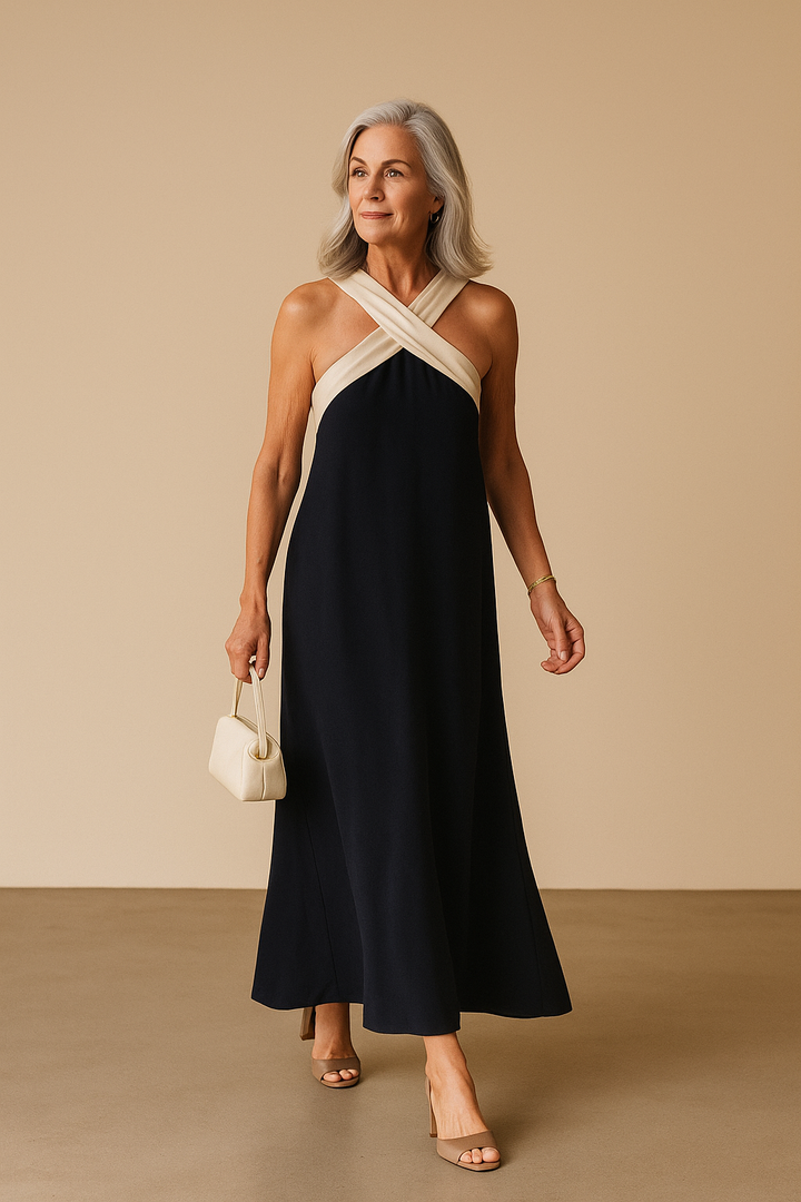Elegant women's cross-neck flowy summer dress in a vibrant color, perfect for beach vacations.