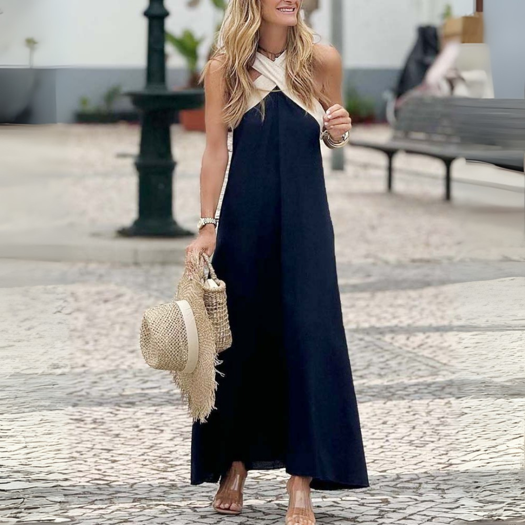 Fashionable women's cross-neck beach dress, elegant and breezy, perfect for summer days.