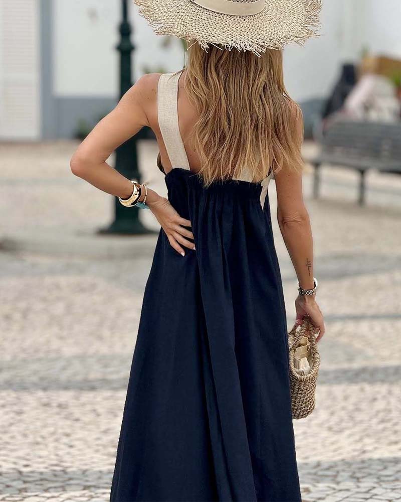 Women's elegant cross-neck summer dress, an A-line flowy style for versatile warm-weather fashion.