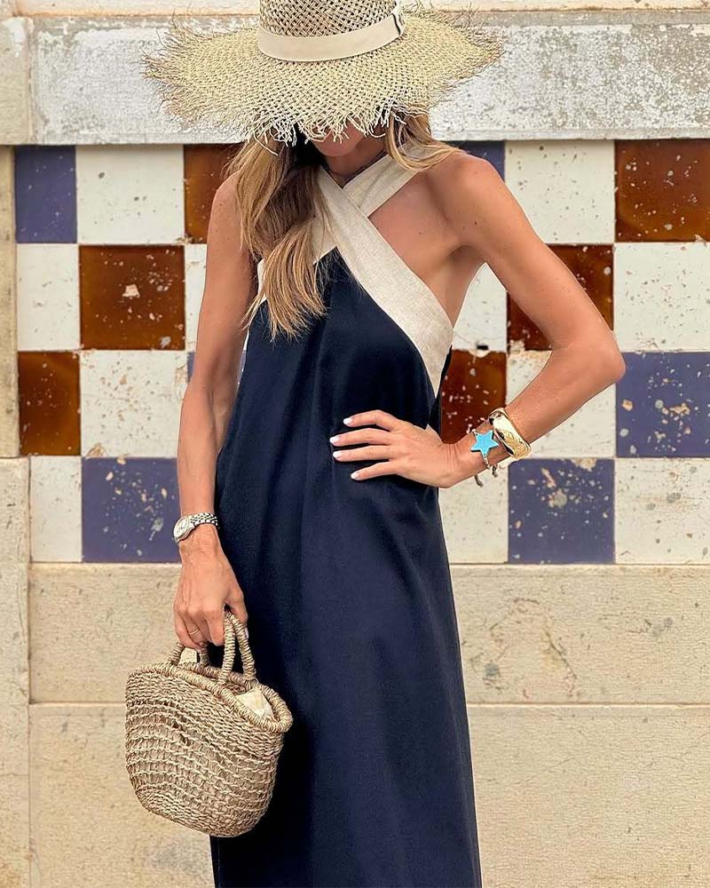 Comfortable women's elegant A-line summer dress, cross-neck design, perfect for a chic beach look.
