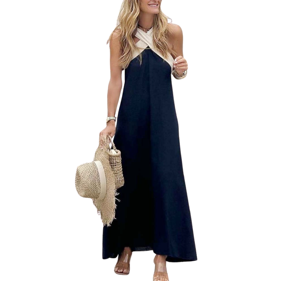 Lightweight women's cross-neck flowy dress, ideal for summer, offering elegant style for any occasion.