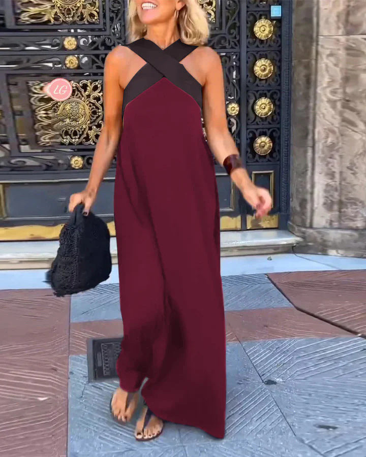 Elegant women's flowy maxi dress, featuring a flattering cross neck, great for any occasion.