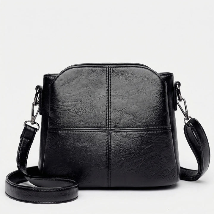 Chic women's accessory: a new crossbody shoulder bag with a distinct stitched design, combining elegance and utility.