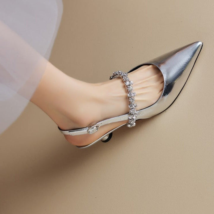 Elegant women's crystal strap slingback heels with a sharp pointed toe, perfect for parties & evening wear.