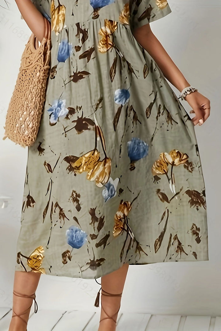 Dark khaki women's elegant printed floral midi dress. Ideal for spring and summer fashion, with a chic defined waist.