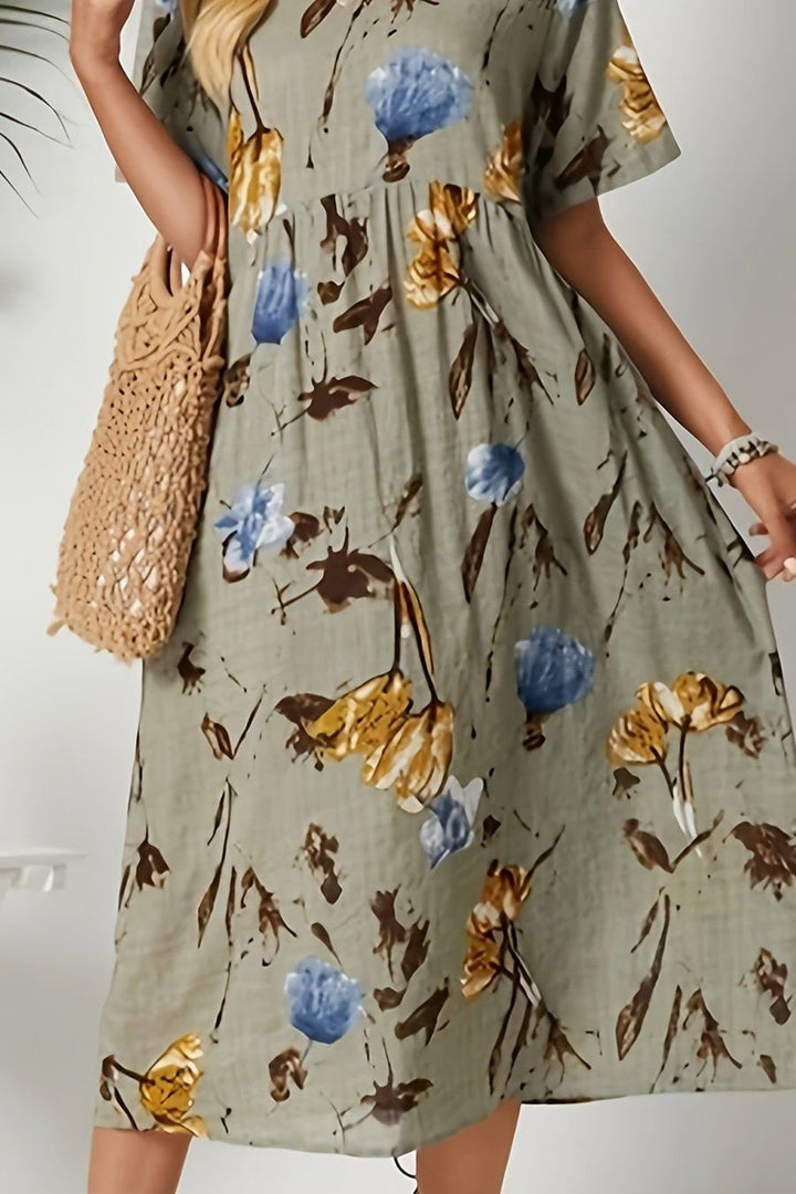 Versatile women's elegant floral midi dress in dark khaki, with a waist-defined silhouette for casual or occasion wear.