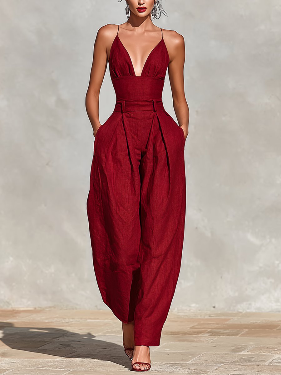 Elegant women's deep V-neck wide-leg formal jumpsuit for evening parties & special occasions.