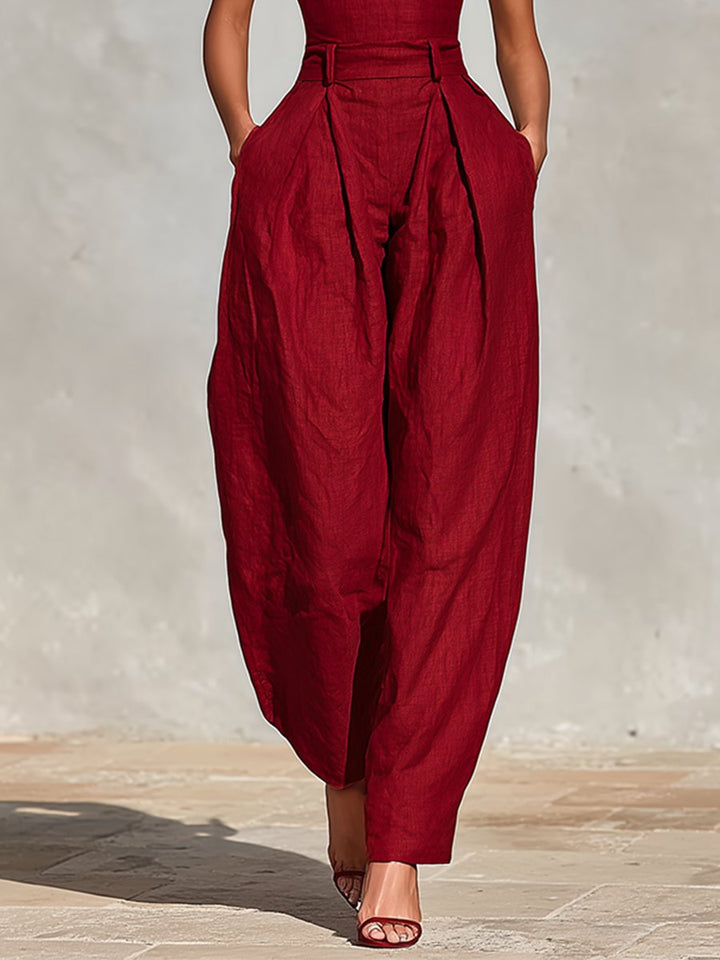 Sophisticated women's elegant formal jumpsuit with deep V-neck & wide legs for evening & events.