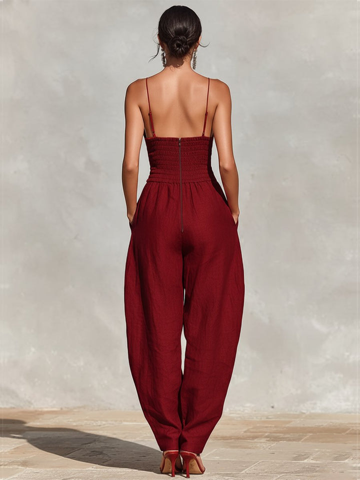 Sleeveless elegant women's deep V-neck formal jumpsuit with wide legs, ideal for summer evening wear.