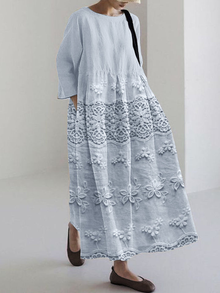 Stylish white women's delicate lace midi dress. Comfortable, flowy design, ideal for any elegant occasion.