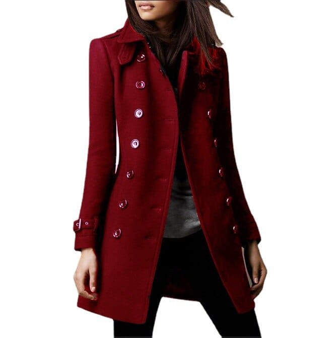 Warm women's tailored double-breasted trench coat. Sophisticated outerwear for elegant fall/winter looks.