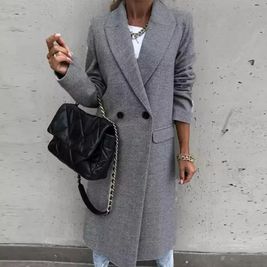 Classic women's double-breasted trench coat. Long, elegant outerwear, ideal for formal workwear & chic winter fashion.