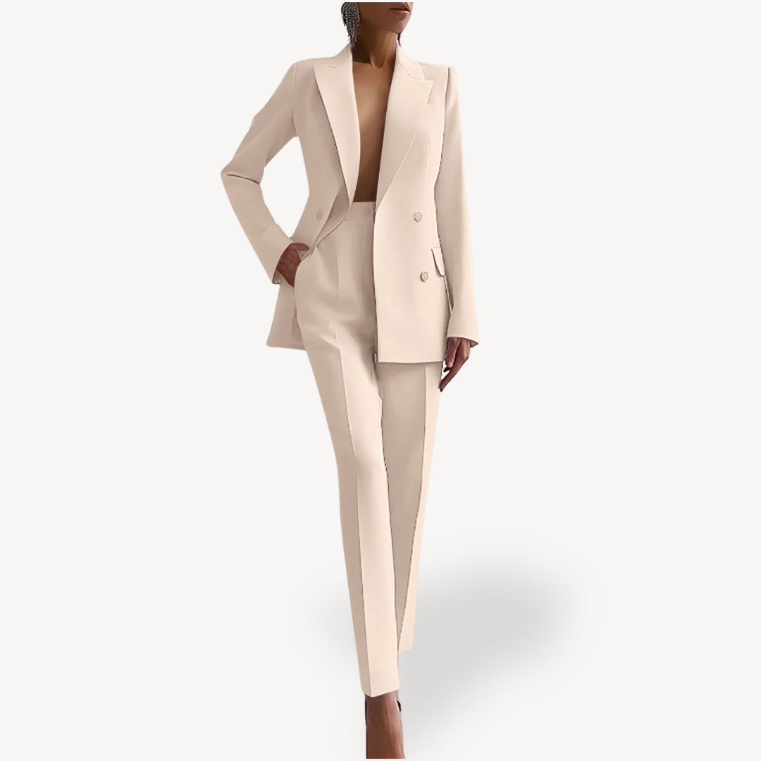 Stylish women's double-breasted blazer and tailored pant suit. Professional business attire for a powerful office look.