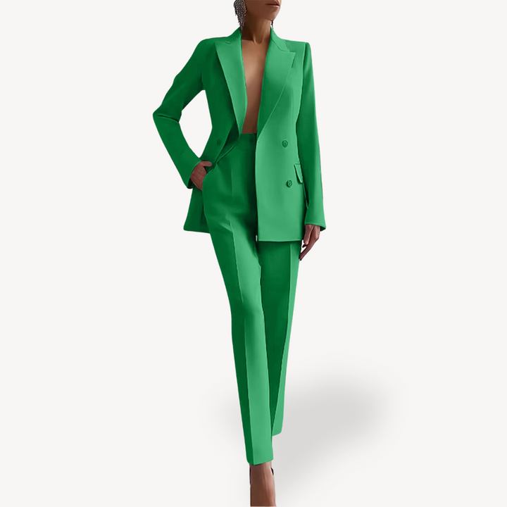 Coordinated women's double-breasted pant suit set. Elegant business attire, perfect as a professional office outfit.