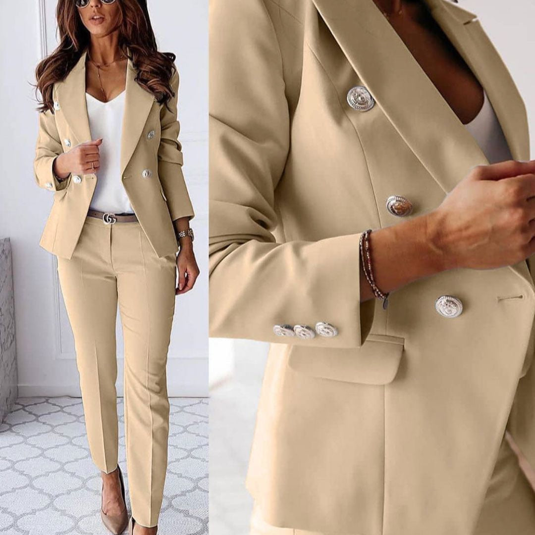Modern double-breasted blazer for women, a key piece of this tailored suit set. Professional office wear.