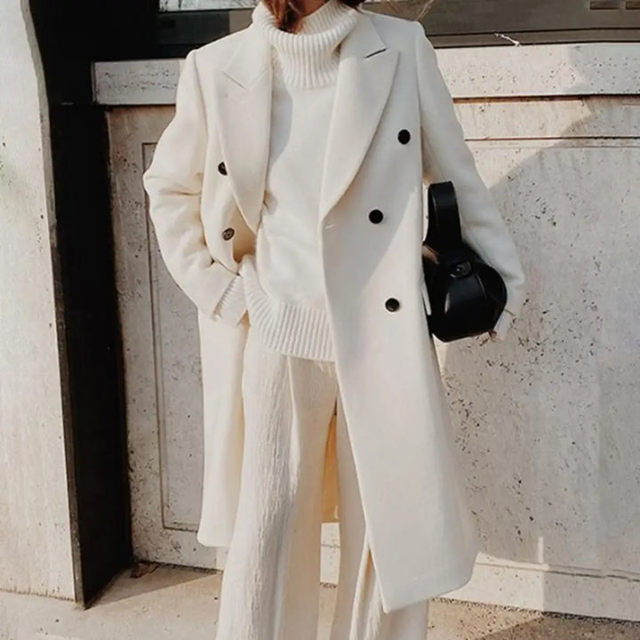 Sophisticated women's classic double-breasted trench coat with notch collar. Lined elegant outerwear for office fashion.