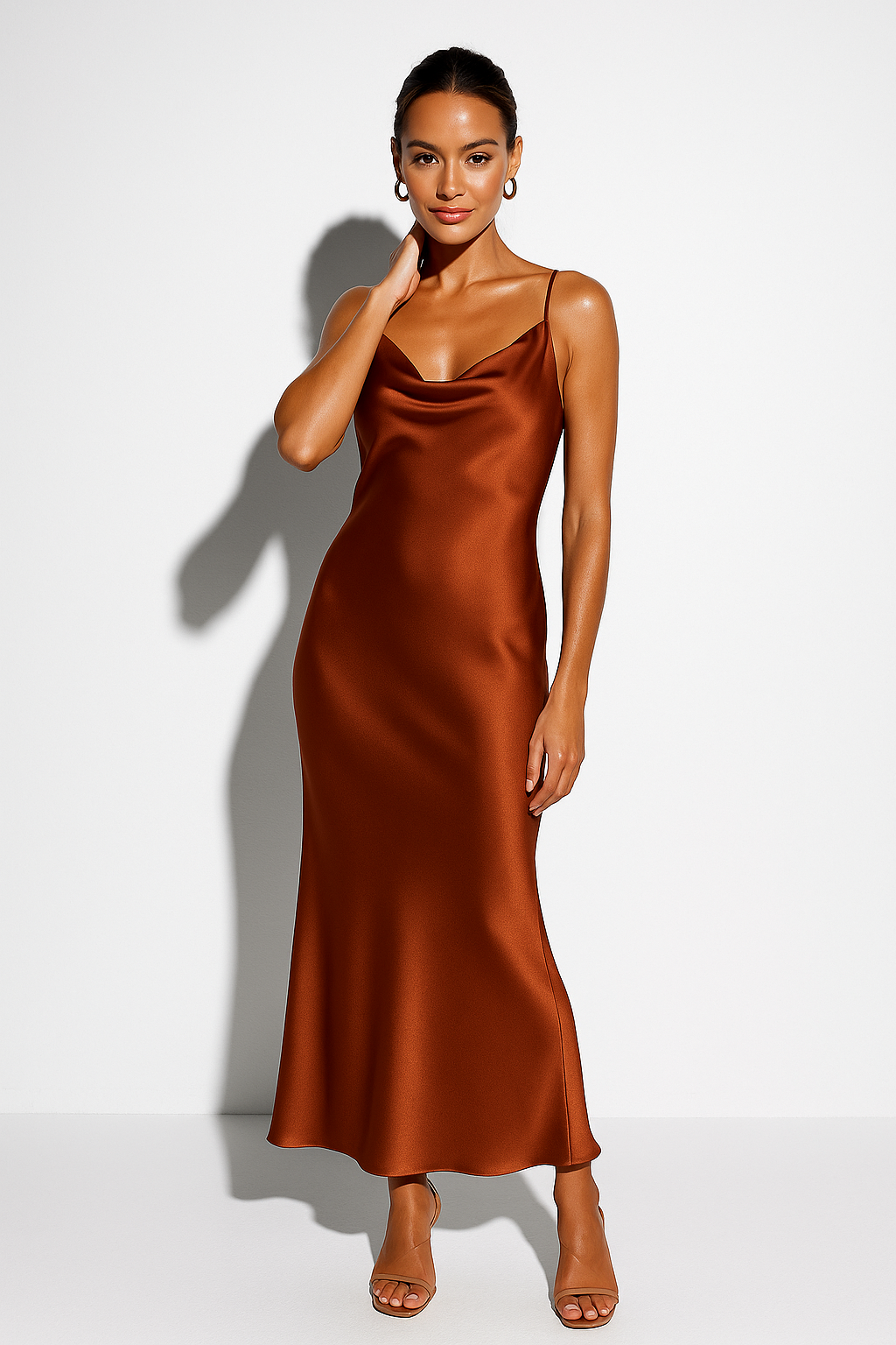 Chic women's draped cowl neck midi dress, a versatile elegant sleeveless formal or party dress.