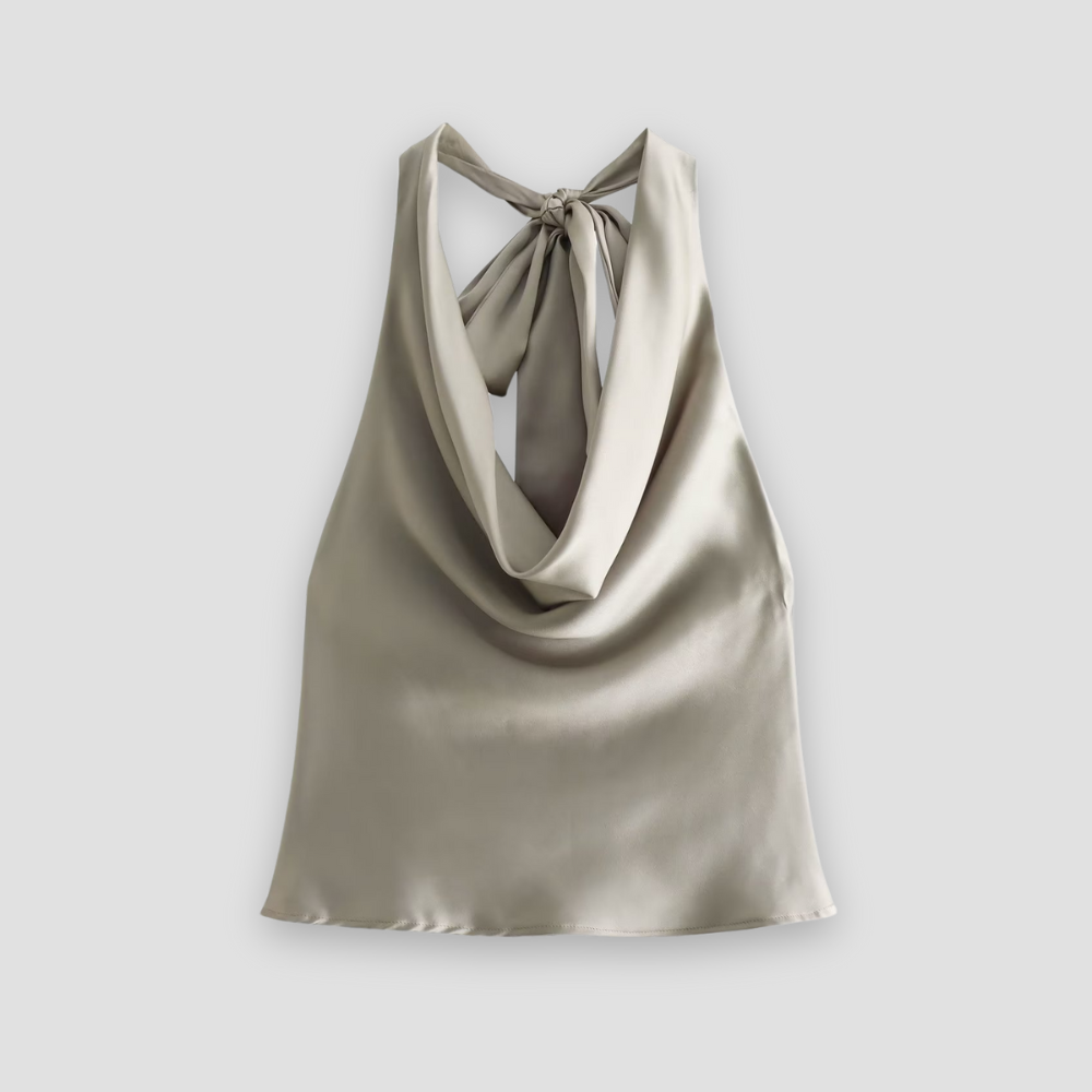 Chic women's sleeveless halter top with elegant draping, perfect for dressy occasions and summer fashion.