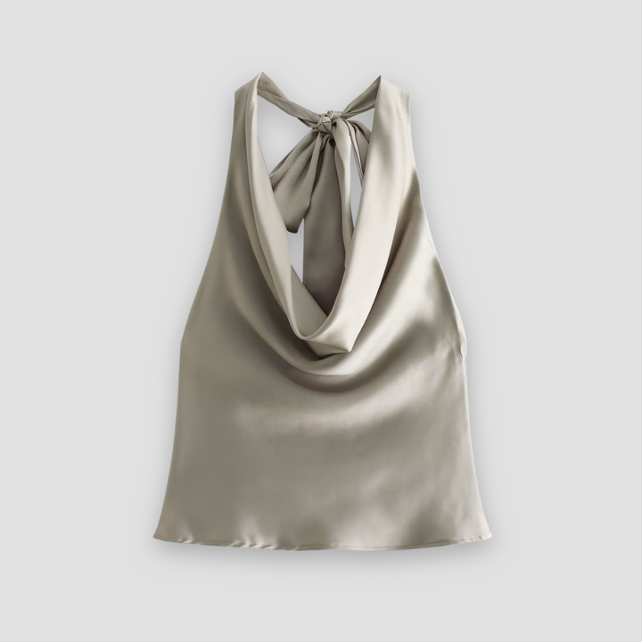 Chic women's sleeveless halter top with elegant draping, perfect for dressy occasions and summer fashion.