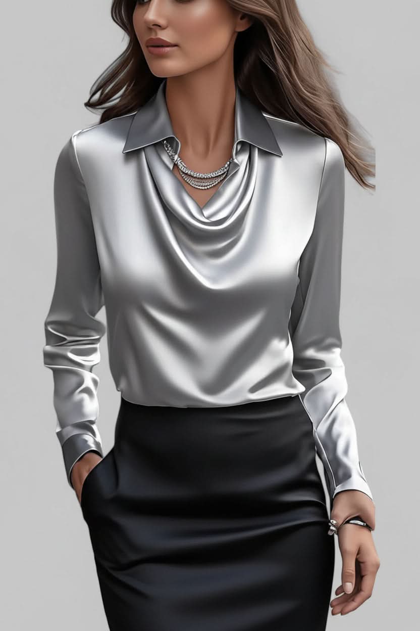 Modern women's long sleeve top with an elegant drape, ideal for professional office attire.