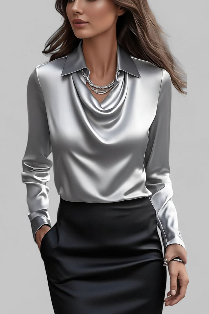 Modern women's long sleeve top with an elegant drape, ideal for professional office attire.