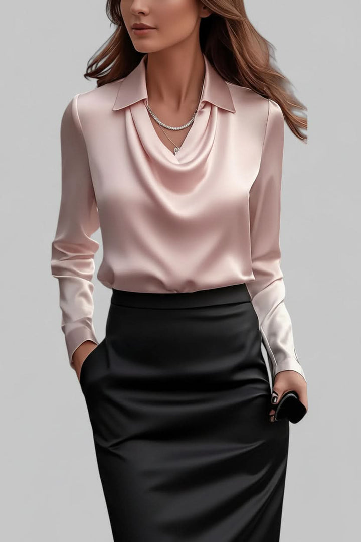 Sophisticated women's draped long sleeve blouse, a versatile top for chic business casual outfits.