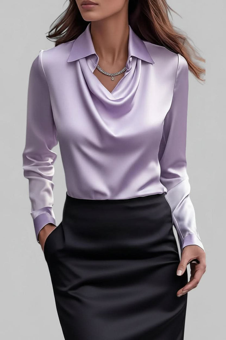 Elegant long sleeve blouse for women, a draped top offering a chic, modern business casual style.