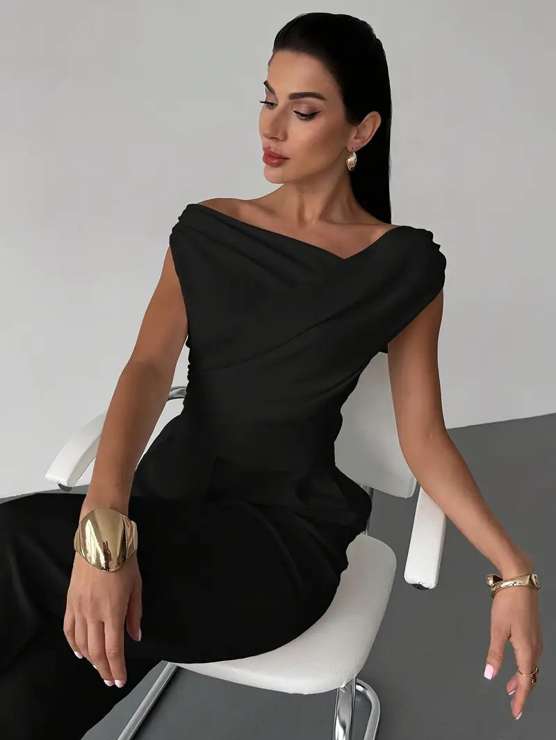 Versatile white draped shoulder top for women, easily transitioning from day to night style.