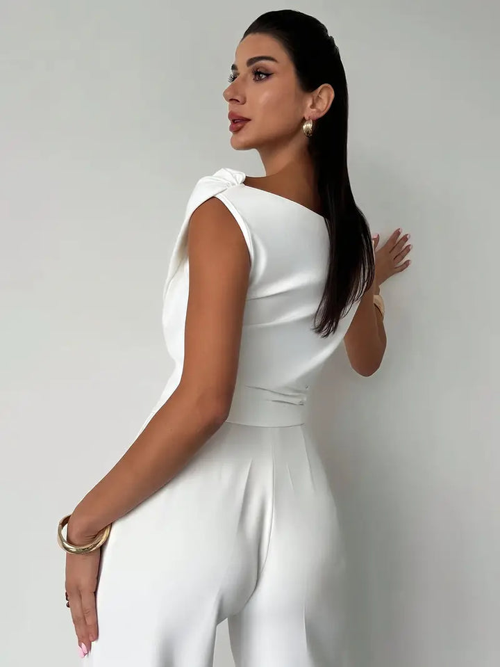Luxurious women's draped shoulder top, ideal for evening outfits and sophisticated events.