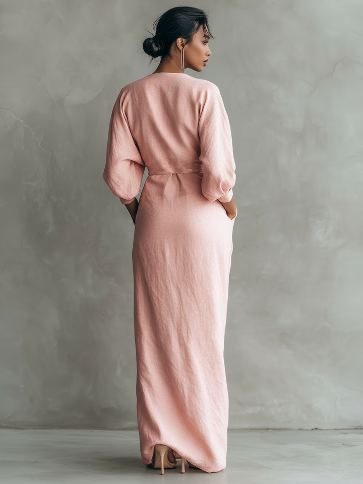 Chic V-neck batwing sleeve maxi dress, ideal for wedding guests & evening parties. Flowy and sophisticated.