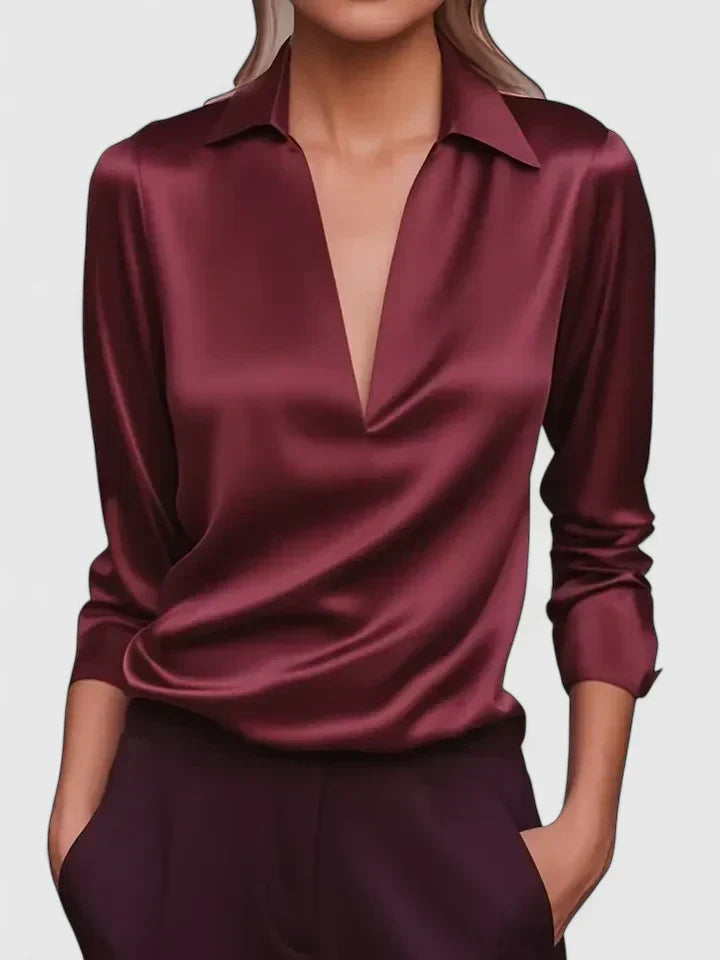 Versatile women's v-neck top. Long sleeve, relaxed fit blouse, perfect for elegant office attire or evening events.