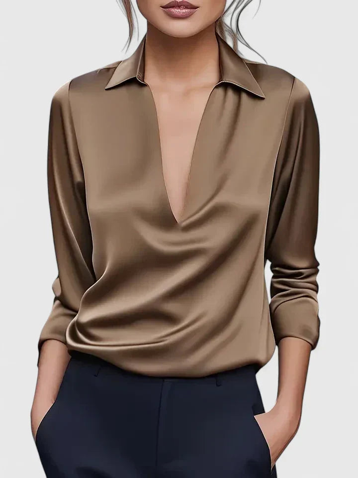 Stylish women's blouse with elegant drape. V-neck, long sleeve, relaxed fit, suitable for versatile styling.
