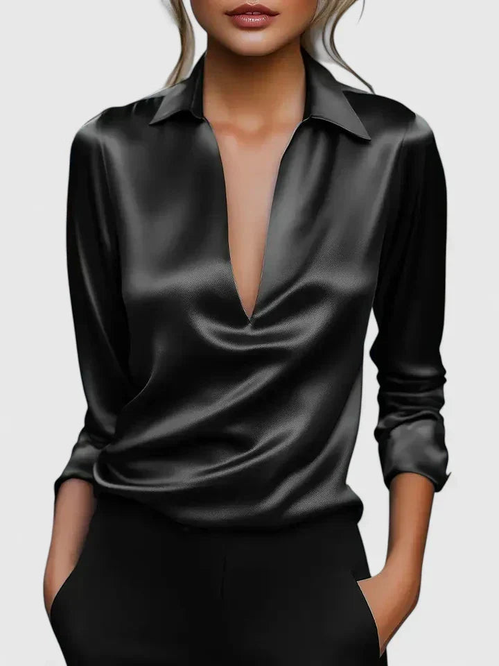 Classic women's v-neck top. Draped long sleeve blouse with a relaxed, comfortable fit for any elegant event.