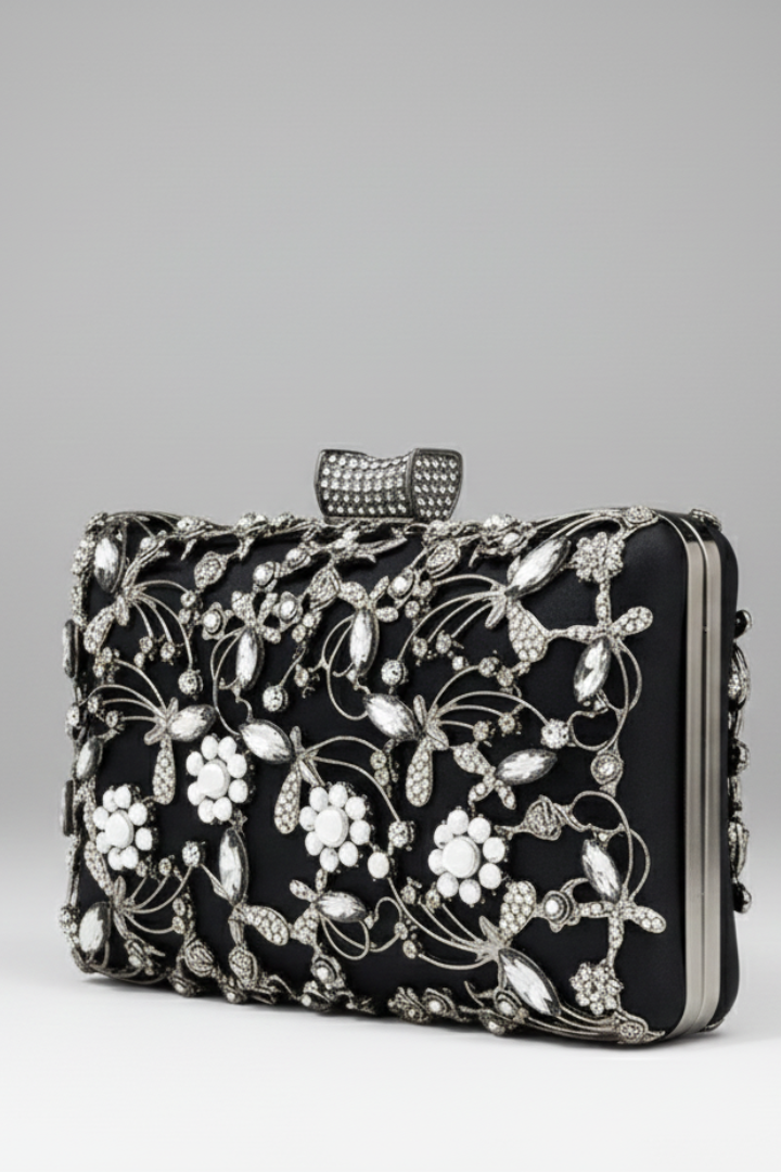 Stylish women's embroidered handbag featuring decorative stones; a versatile clutch for formal occasions.