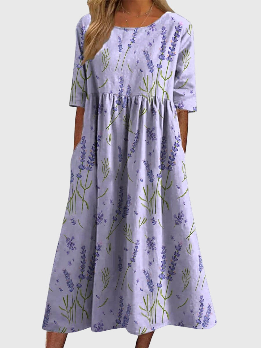 Stylish women's flowy midi dress with delicate embroidery, ideal for a relaxed fit and elegant summer style.