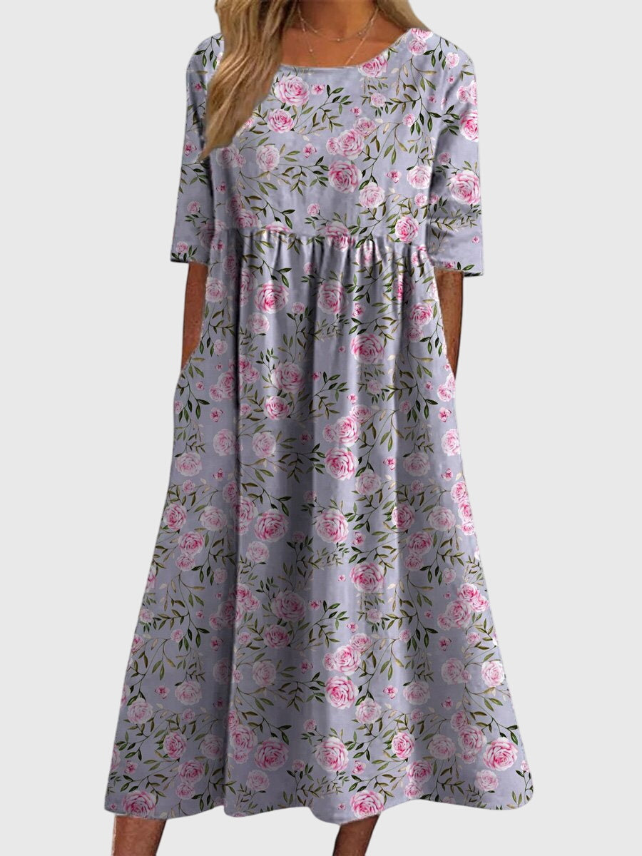 Chic embroidered women's midi dress, designed with a relaxed flowy fit for ultimate comfort and elegant fashion.
