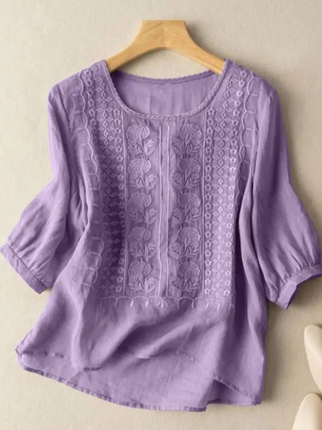 Stylish women's embroidered relaxed fit blouse. Comfortable long sleeve top, great for summer office wear.
