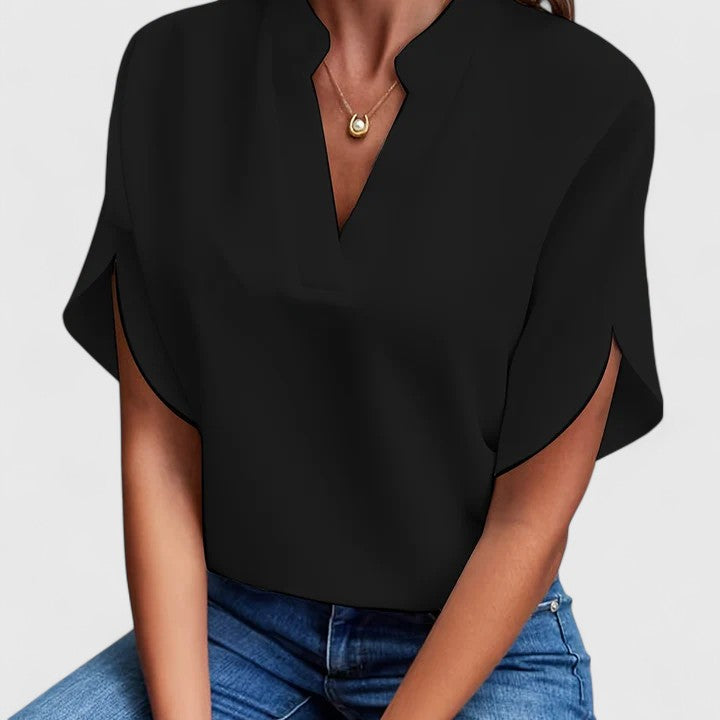 White elegant women's blouse, chic style. Versatile top for summer fashion, casual outings or office.