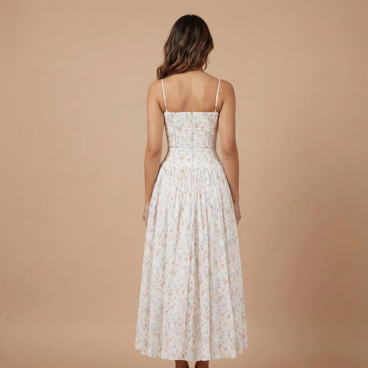 Vibrant floral print midi dress for women, featuring a stylish corset bodice, perfect for summer events.