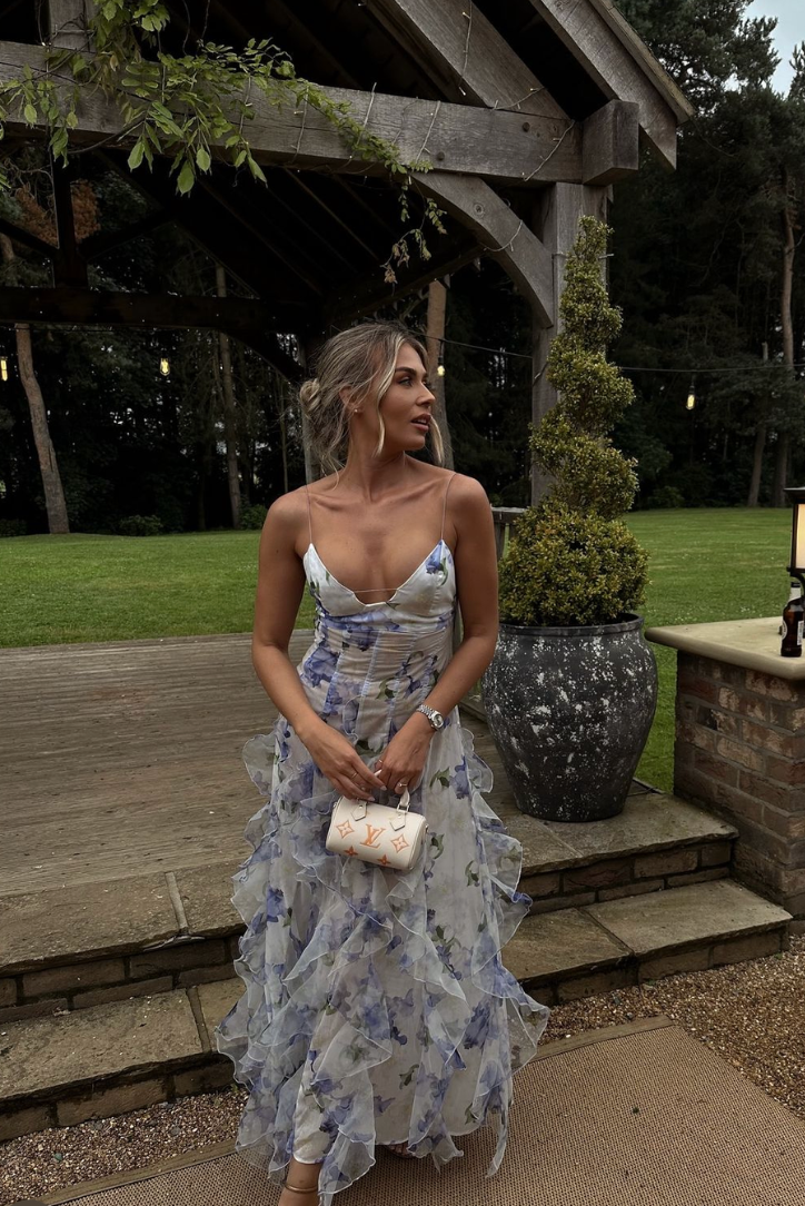 Adjustable strap floral corset maxi dress with elegant ruffles, a sophisticated choice for any wedding guest.
