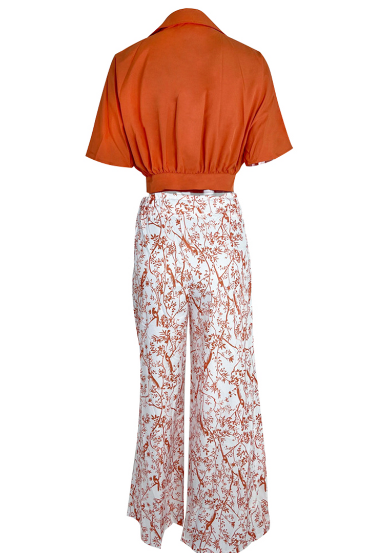 Boho chic floral crop top and maxi skirt set for women. Versatile elegant casual wear or vacation fashion.