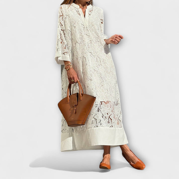 Elegant women's floral embroidered midi dress with short sleeves, perfect for summer parties.