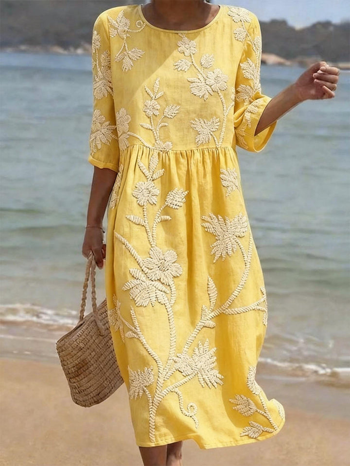Versatile floral embroidered midi dress for women, elegant with 3/4 sleeves, perfect for casual or spring wear.