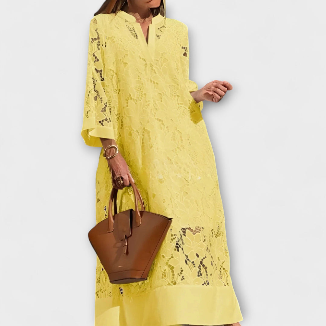 Detailed floral embroidered midi dress for women, ideal for elegant parties and evening events with a comfortable fit.