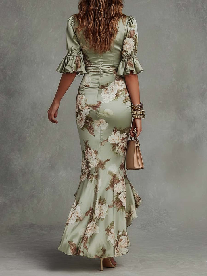 Long women's floral maxi dress featuring a chic fishtail hem and ruched waist, suitable for elegant summer parties.