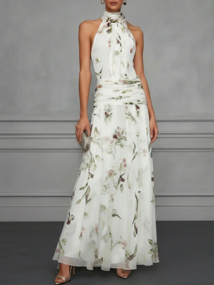 Women's elegant floral halter neck maxi dress, a long sleeveless summer dress with an A-line cut for special occasions.