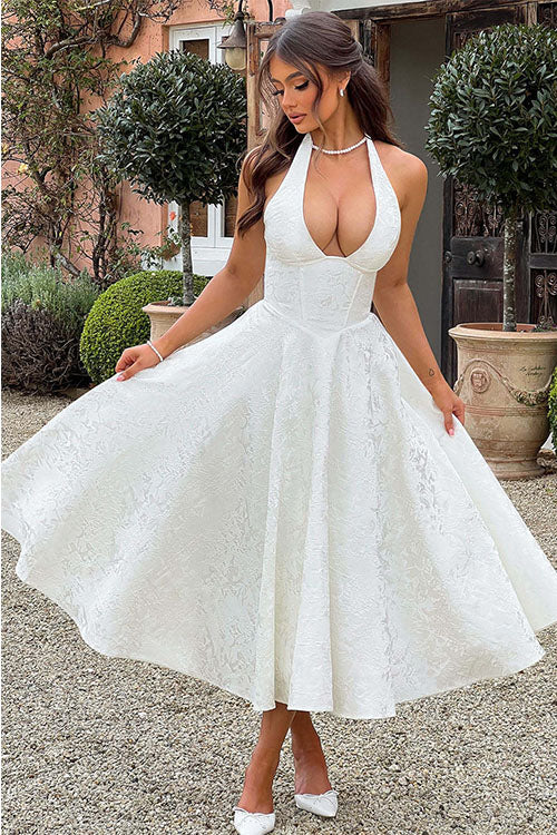 Beautiful women's floral A-line midi dress with a comfortable halter neck and corset style.