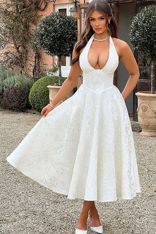 Women's party dress: elegant floral midi, halter neck, corset detailing for a chic look.