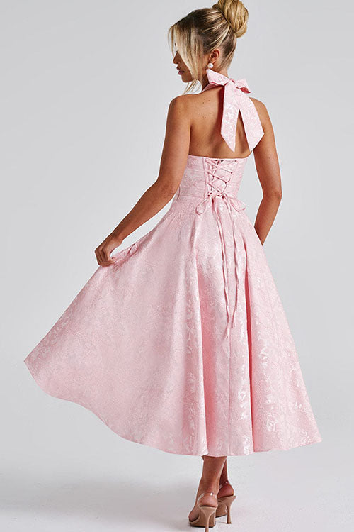 Sophisticated floral print midi dress, perfect for wedding guests, with a stylish halter corset.