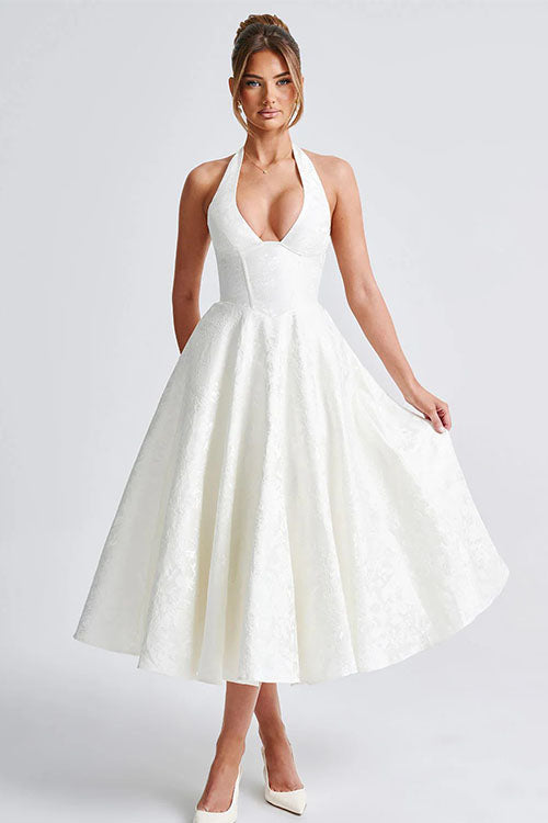 Elegant floral print midi dress, a must-have for wedding guests, with halter and corset.